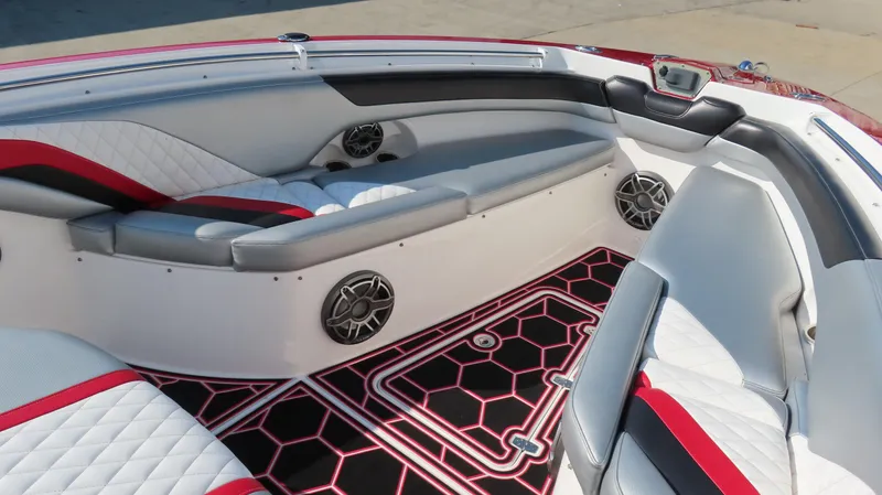 Slide: The Image of 2014 Sunsation 34 CCX boat with four mounted speakers, blue sky background. - 18