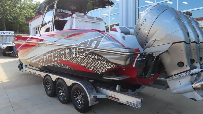 Slide: The Image of 2014 Sunsation 34 CCX boat with triple Mercury 350R engines on a trailer. - 4