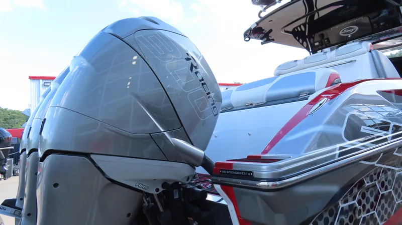 Slide: The Image of 2014 Sunsation 34 CCX boat with triple Mercury 350 engines on a trailer. - 6