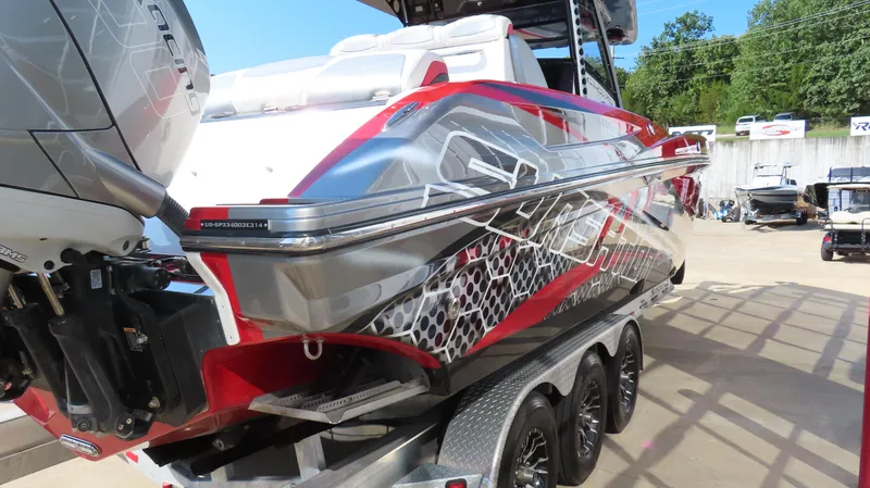 Slide: The Image of Anchor compartment of 2014 Sunsation 34 CCX boat with chain and winch. - 8