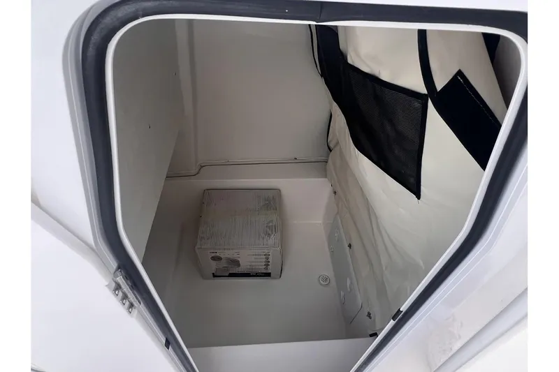 Slide: The Image of Storage compartment of 2025 Sea Fox 228 boat, featuring spacious interior and organized layout. - 12