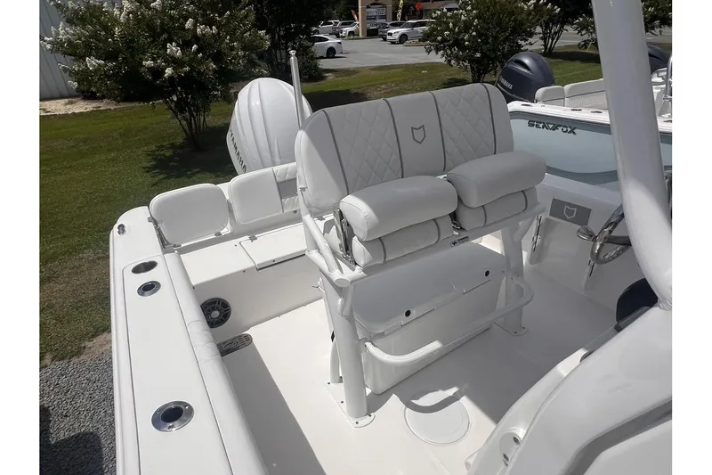 Slide: The Image of 2025 Sea Fox 228 boat interior with white seating and modern design. - 9