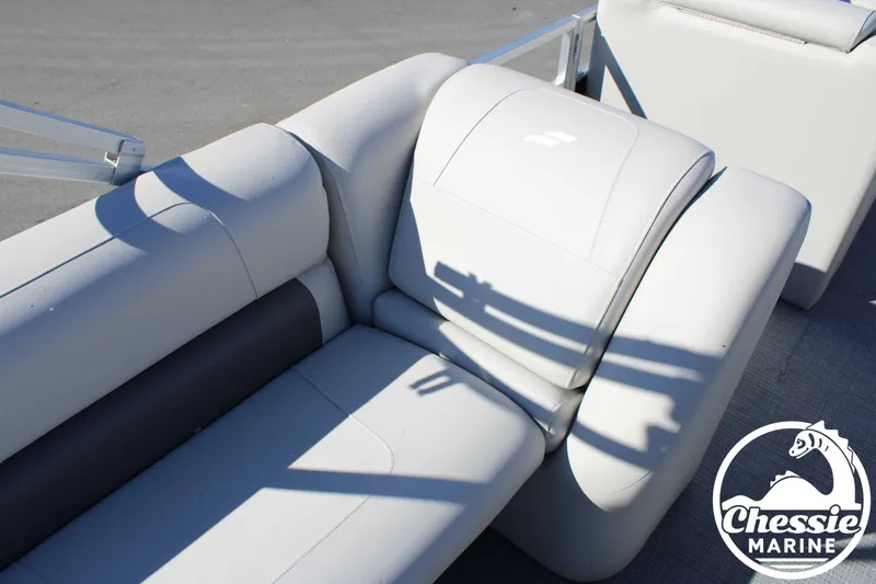 Slide: The Image of 2024 Starcraft Pontoon LX 22 R with white seating, Chessie Marine logo visible. - 14