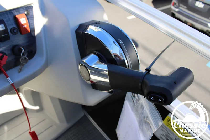 Slide: The Image of 2024 Starcraft Pontoon LX 22 R throttle control and dashboard detail. - 24
