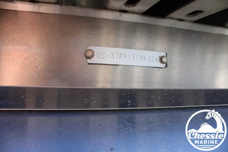 Slide: The Image of 2024 Starcraft Pontoon LX 22 R hull identification number plate, Chessie Marine logo visible. - 27