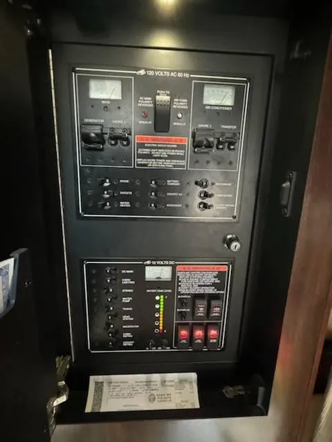 Slide: The Image of Electrical control panel in a 2016 Monterey 355SY boat. - 10