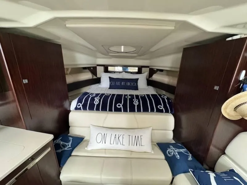 Slide: The Image of Interior of 2016 Monterey 355SY yacht with cozy bed and nautical decor. - 13