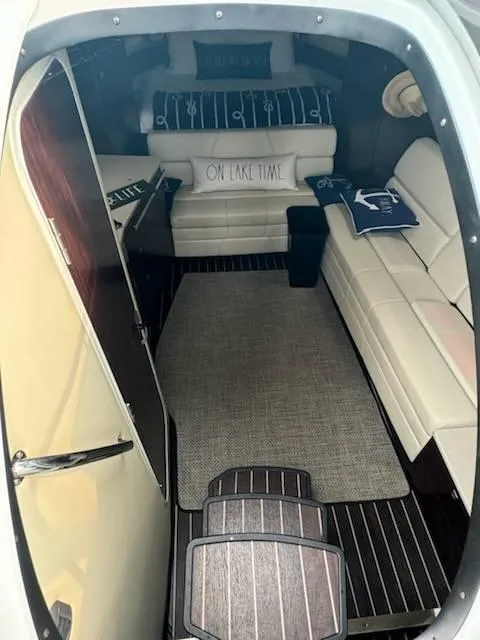 Slide: The Image of Interior of 2016 Monterey 355SY yacht with cozy seating and nautical decor. - 17