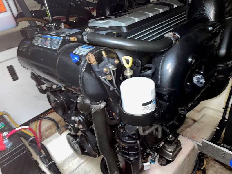 Slide: The Image of Engine compartment of a 2016 Monterey 355SY boat, showcasing detailed mechanical components. - 18