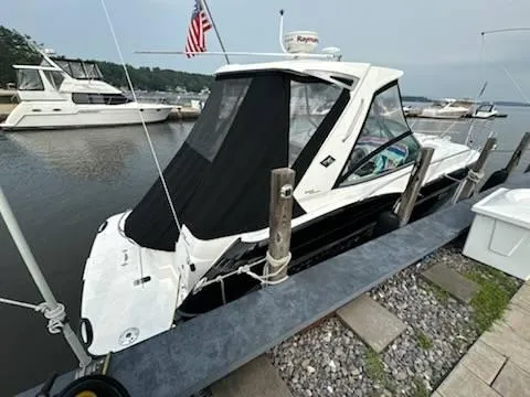 Slide: The Image of 2016 Monterey 355SY yacht docked at marina with American flag. - 4