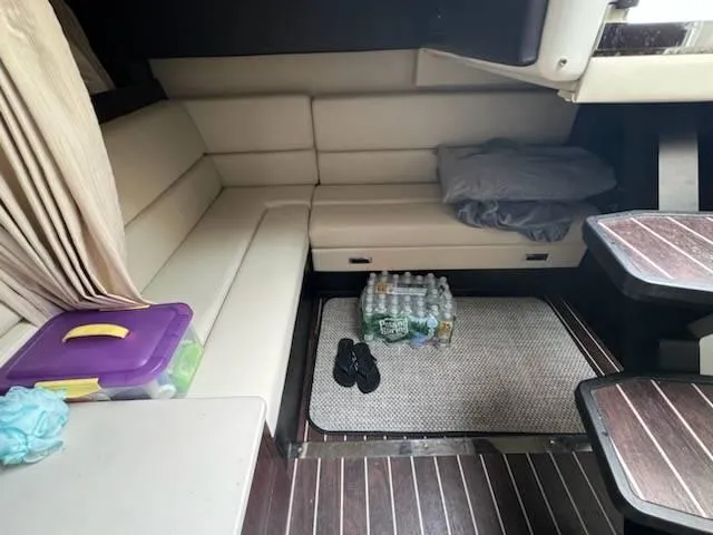Slide: The Image of Interior of 2016 Monterey 355SY yacht with seating, table, and storage. - 9