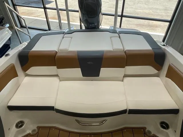Slide: The Image of 2025 Chaparral 19 SSi OB boat interior with cushioned seating. - 6