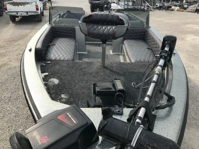 Slide: The Image of 1990 Ranger 375V fishing boat interior with seating and equipment. - 16