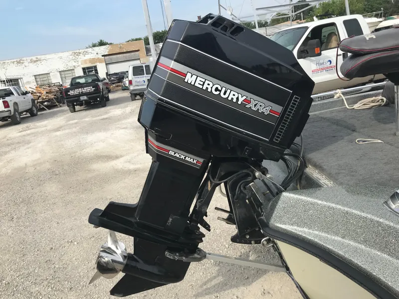 Slide: The Image of 1990 Ranger 375V boat with Mercury XR4 Black Max outboard motor. - 4