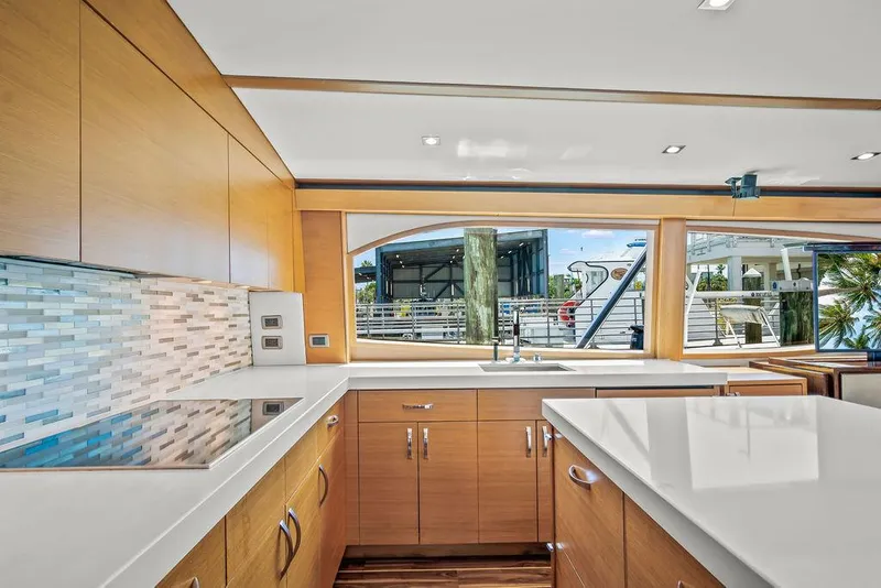 Slide: The Image of Luxurious kitchen interior of 2014 Hatteras 63 GT yacht with modern design. - 42