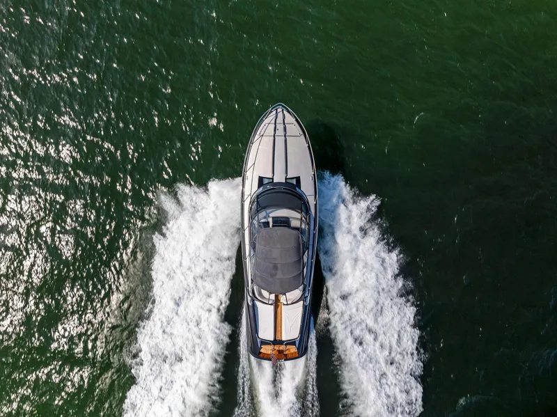 Slide: The Image of Aerial view of 2016 Riva 44 RIVARAMA SUPER yacht cruising on water. - 5