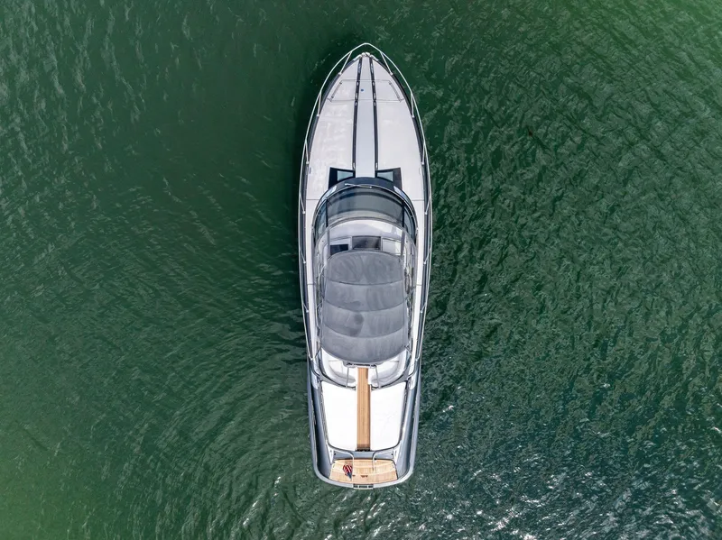 Slide: The Image of Aerial view of 2016 Riva 44 RIVARAMA SUPER yacht on green water. - 7
