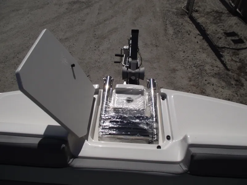 Slide: The Image of 2025 Bayliner D20 boat with open storage compartment on deck. - 5