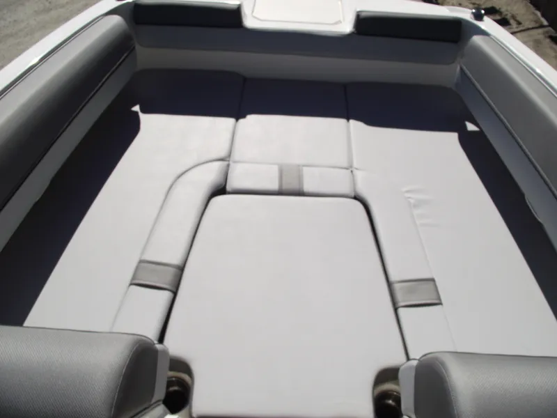 Slide: The Image of 2025 Bayliner D20 boat interior with cushioned seating area. - 6