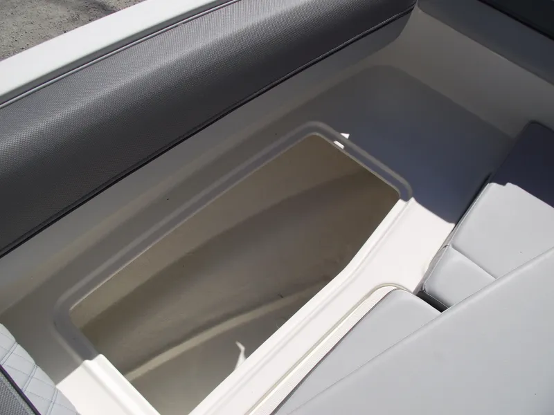 Slide: The Image of Storage compartment in 2025 Bayliner D20 boat with cushioned seating. - 8