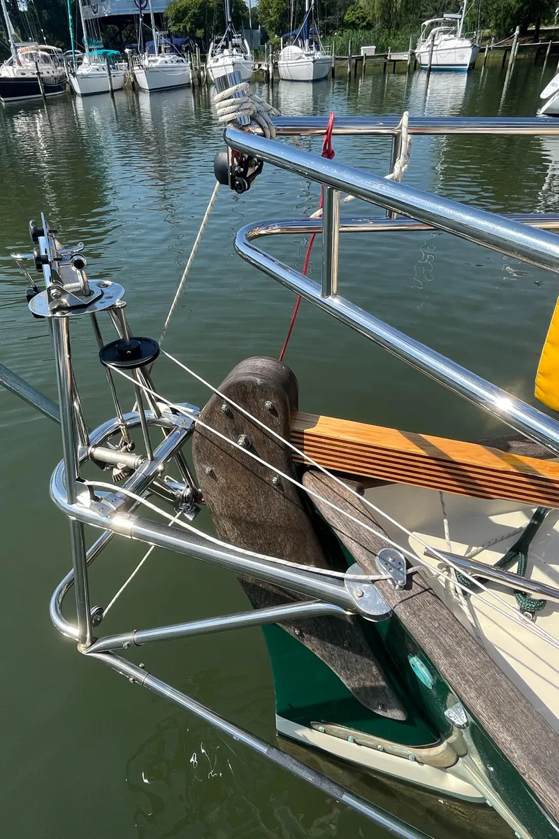Slide: The Image of Seal resting on Alajuela 38 sailboat in marina, 2016. - 13
