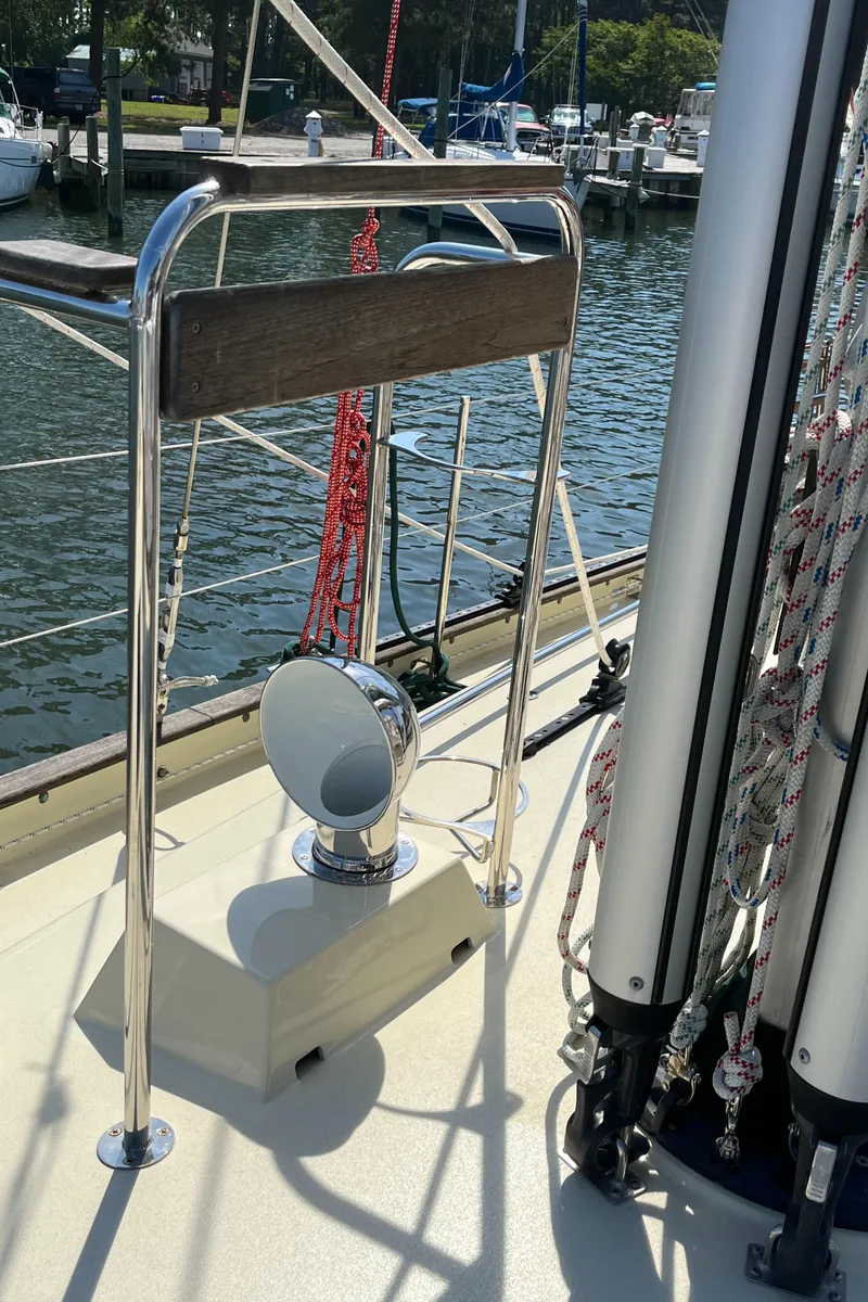 Slide: The Image of Sailboat deck with polished metal fittings, ropes, and a winch; Alajuela 38, 2016 model. - 24