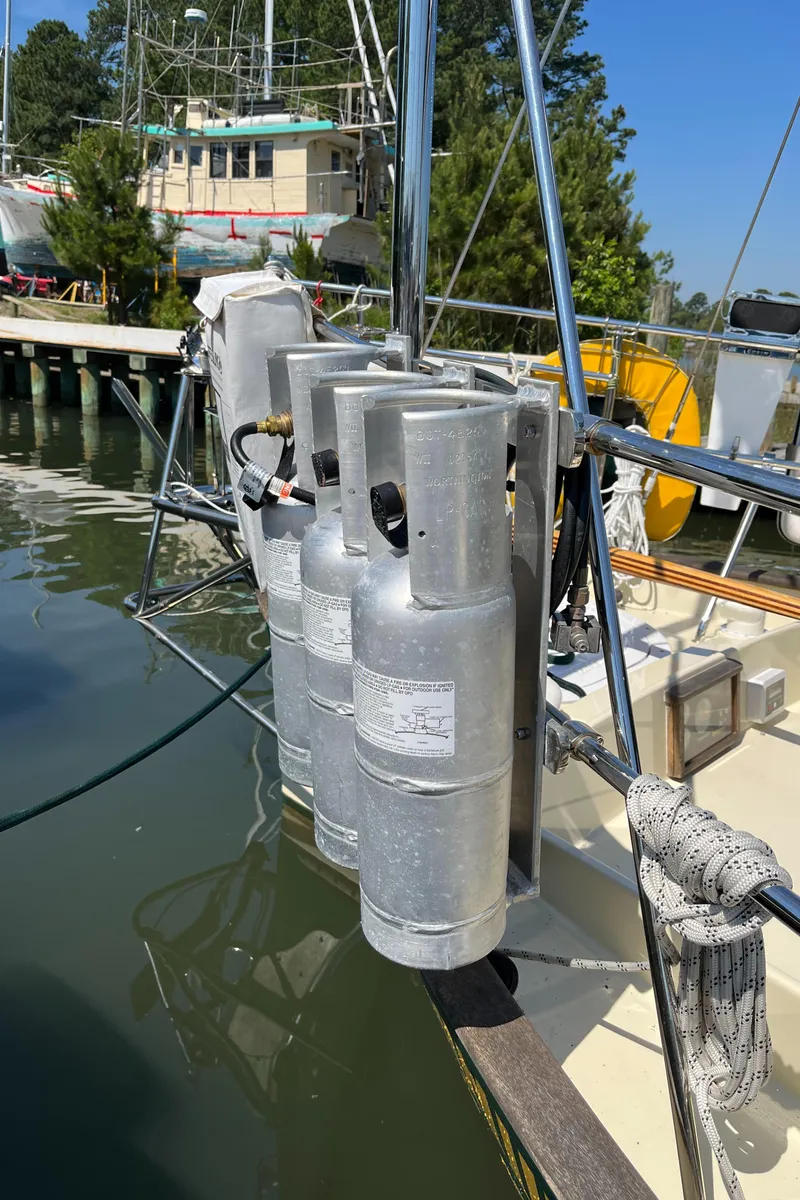 Slide: The Image of Propane tanks on Alajuela 38 sailboat, docked near marina, 2016 model. - 39
