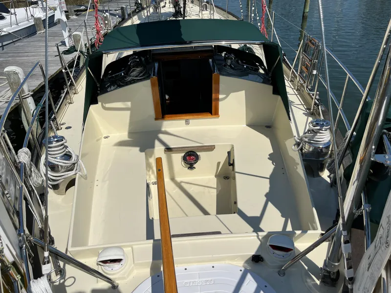 Slide: The Image of Alajuela 38 sailboat cockpit, 2016 model, with green canopy and wooden accents. - 41