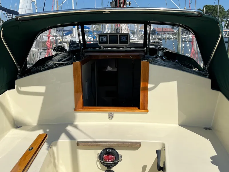 Slide: The Image of Cockpit of 2016 Alajuela 38 sailboat with navigation instruments and wooden trim. - 42