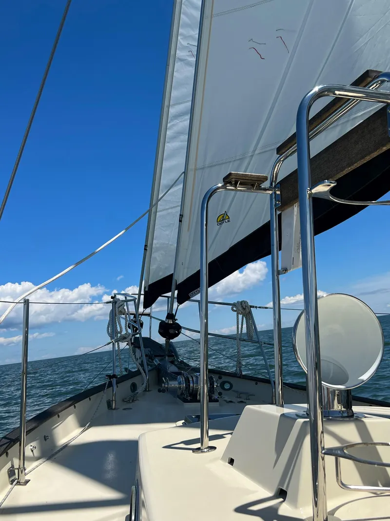 Slide: The Image of Sailing on a 2016 Alajuela 38 yacht under clear blue skies. - 7