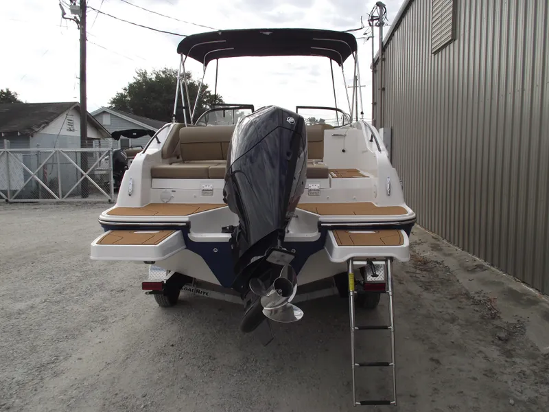 Slide: The Image of 2025 Bayliner D22 boat, rear view with outboard motor and swim platform. - 3