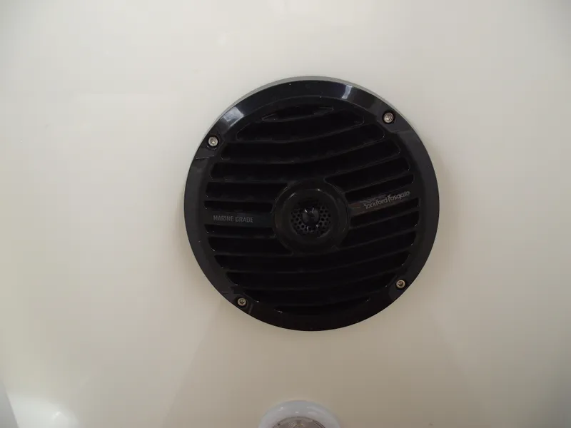 Slide: The Image of Close-up of a speaker on a 2025 Bayliner D22 boat. - 32