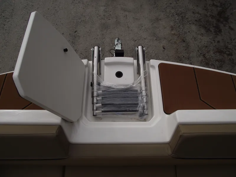 Slide: The Image of 2025 Bayliner D22 boat with open hatch and ladder on deck. - 5