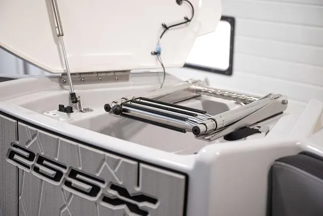 Slide: The Image of 2024 Yamaha Boats 255XE swim platform with foldable ladder. - 18