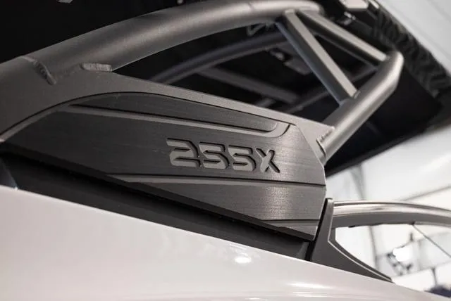 Slide: The Image of Close-up of 2024 Yamaha Boats 255XE model detail, showcasing sleek design elements. - 25