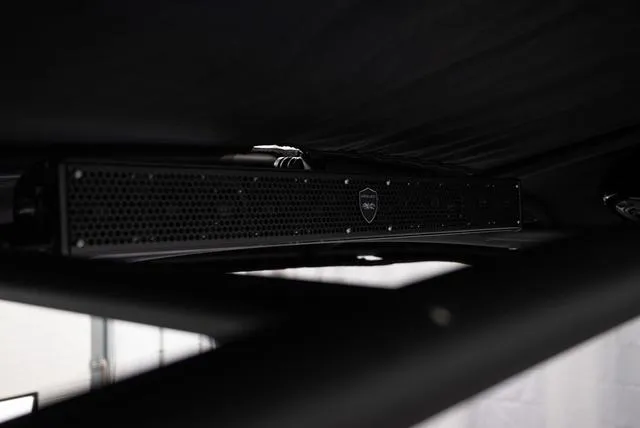 Slide: The Image of 2024 Yamaha Boats 255XE interior speaker system, sleek design, black finish. - 30