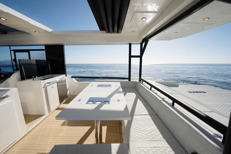 Slide: The Image of Luxurious 2025 De Antonio Yachts D50 Coupé interior with ocean view. - 24