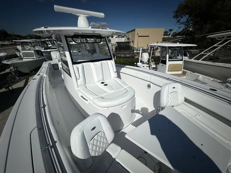 Slide: The Image of 2025 Sportsman Open 352 boat with sleek white interior and modern design. - 11