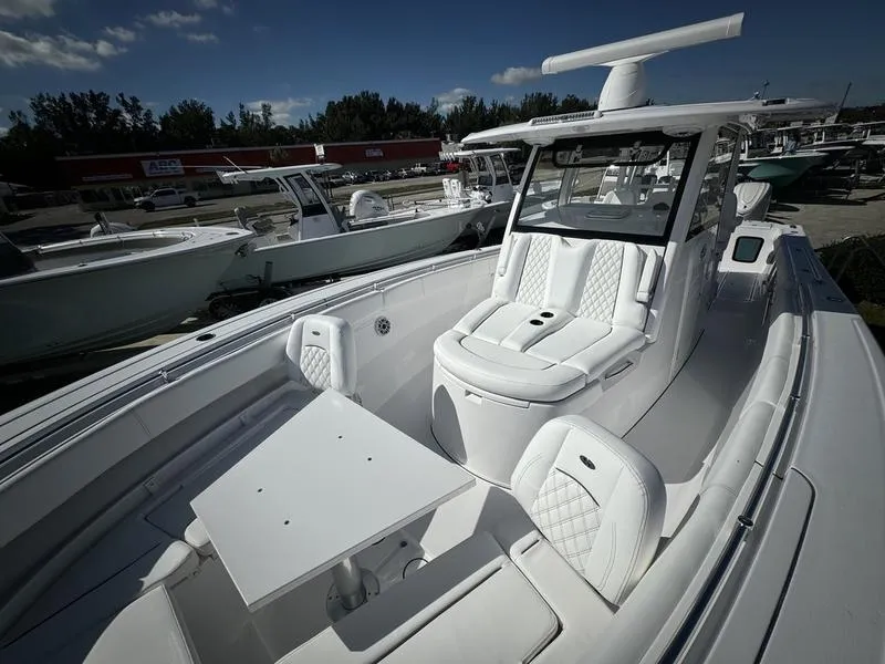 Slide: The Image of 2025 Sportsman Open 352 boat with luxurious seating and sleek design. - 12
