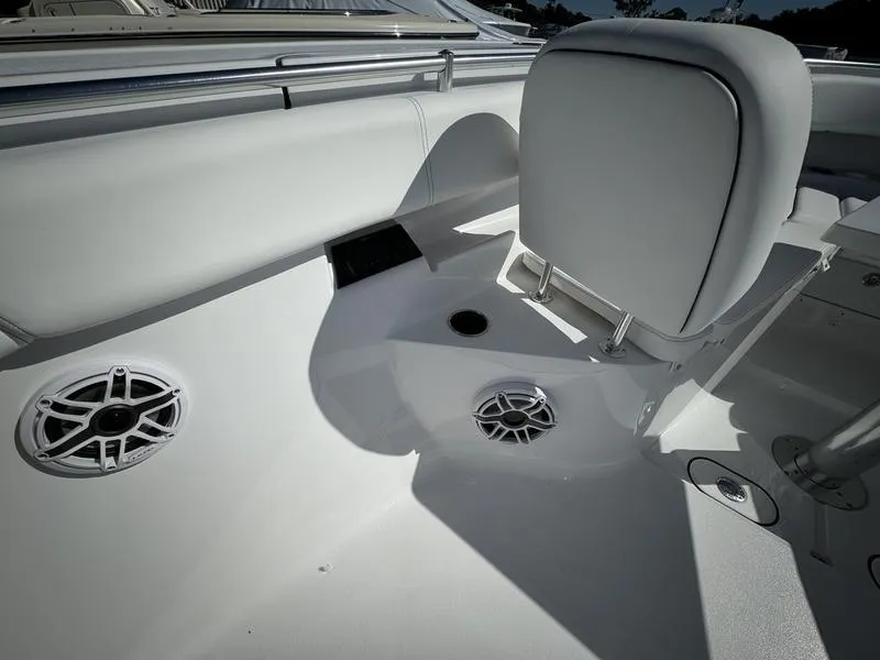 Slide: The Image of 2025 Sportsman Open 352 boat interior with speakers and seating. - 18
