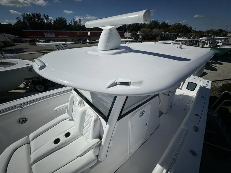 Slide: The Image of 2025 Sportsman Open 352 boat with sleek design and advanced radar system. - 19