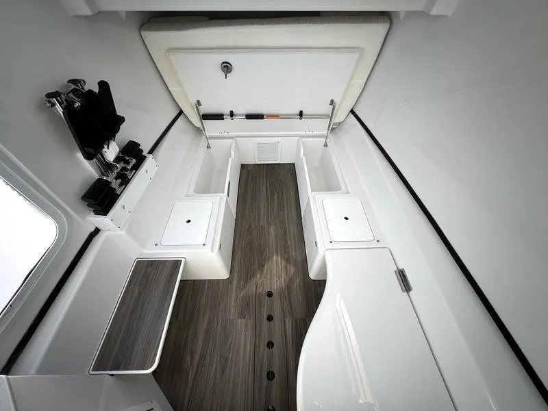 Slide: The Image of Interior view of 2025 Sportsman Open 352 boat, featuring sleek design and ample storage. - 23