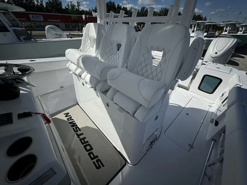 Slide: The Image of 2025 Sportsman Open 352 boat interior with white seating and console. - 34