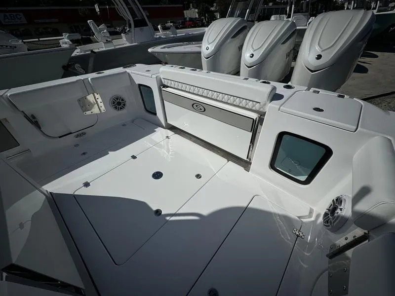 Slide: The Image of 2025 Sportsman Open 352 boat interior with triple engines, spacious deck, and modern design. - 42