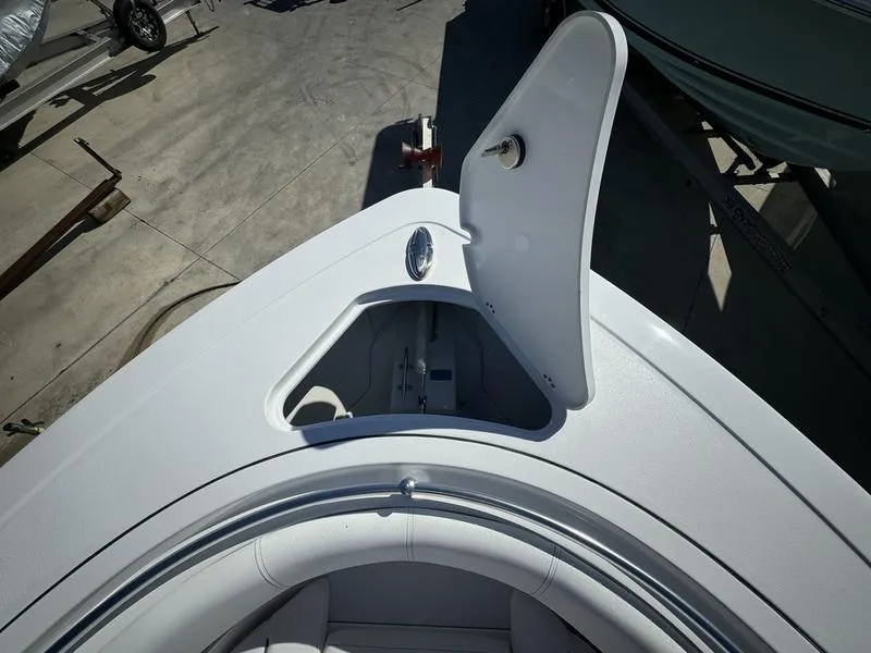 Slide: The Image of 2025 Sportsman Open 352 boat bow with open storage compartment. - 6