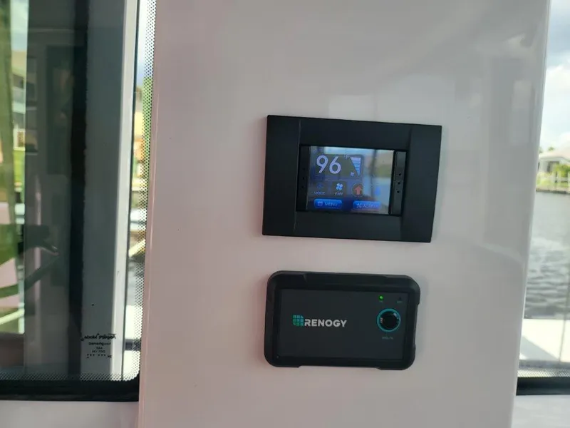 Slide: The Image of Control panel on 2024 Axopar 37 XC CROSS CABIN boat interior. - 13