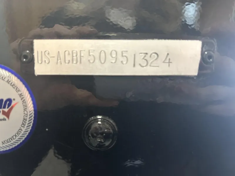 Slide: The Image of 2024 Alumacraft Competitor FSX 185 hull identification number plate. - 13