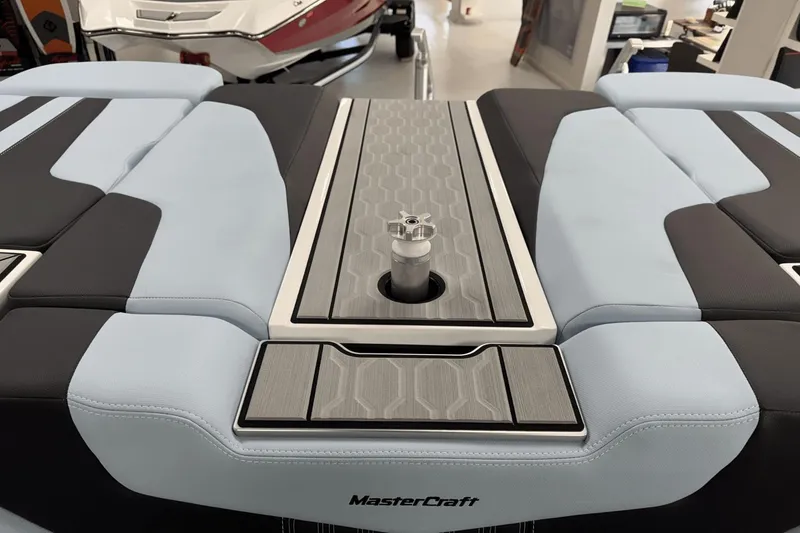 Slide: The Image of 2025 MasterCraft XT22 boat interior with sleek, modern design and premium upholstery. - 20