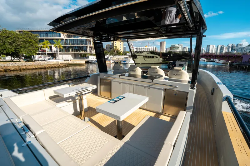 Slide: The Image of Luxury De Antonio Yachts D50 OPEN 2025 model, featuring spacious deck and modern design. - 18