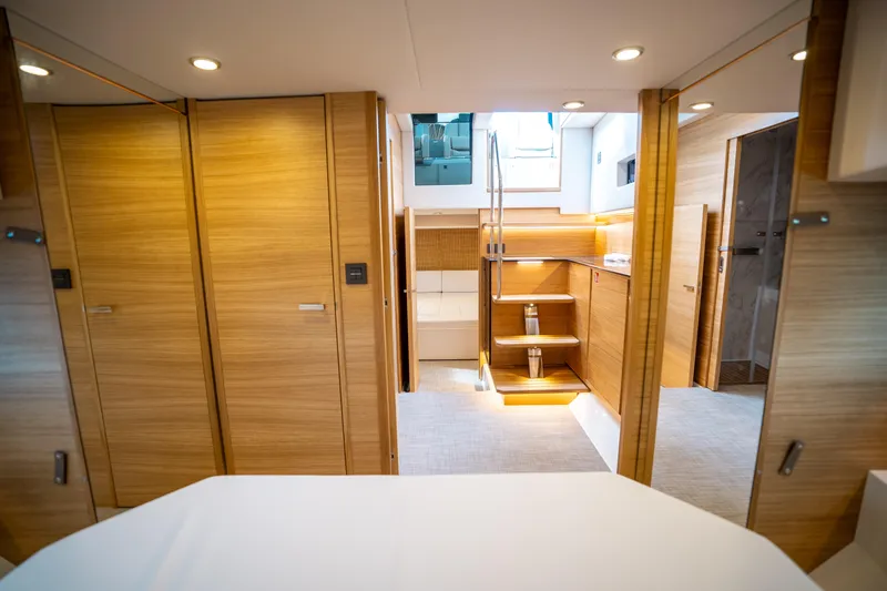 Slide: The Image of Luxurious interior of 2025 De Antonio Yachts D50 OPEN, featuring modern wood finishes and elegant design. - 44